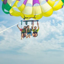 Friends enjoy flying with us in Parasailing